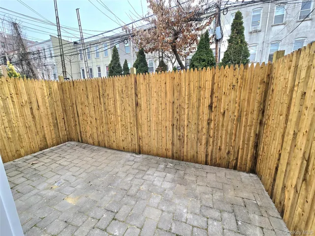 a view of a wooden fence