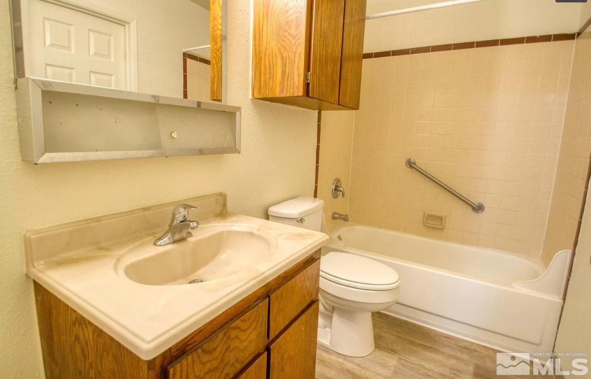 360 Jill Court, Unit 6 Fernley, NV 89408 - Photo 9 of 9 a bathroom with a sink toilet and shower