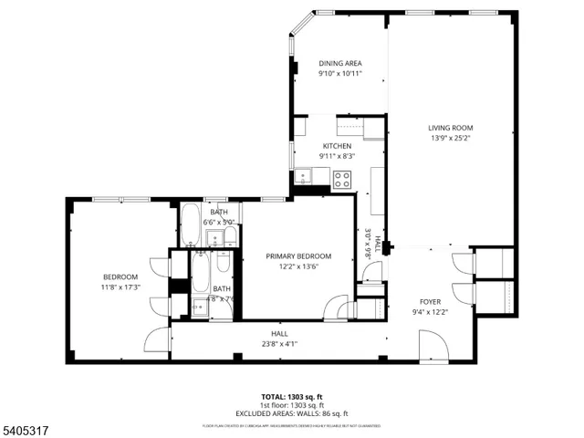 a bedroom with bed and a chandelier