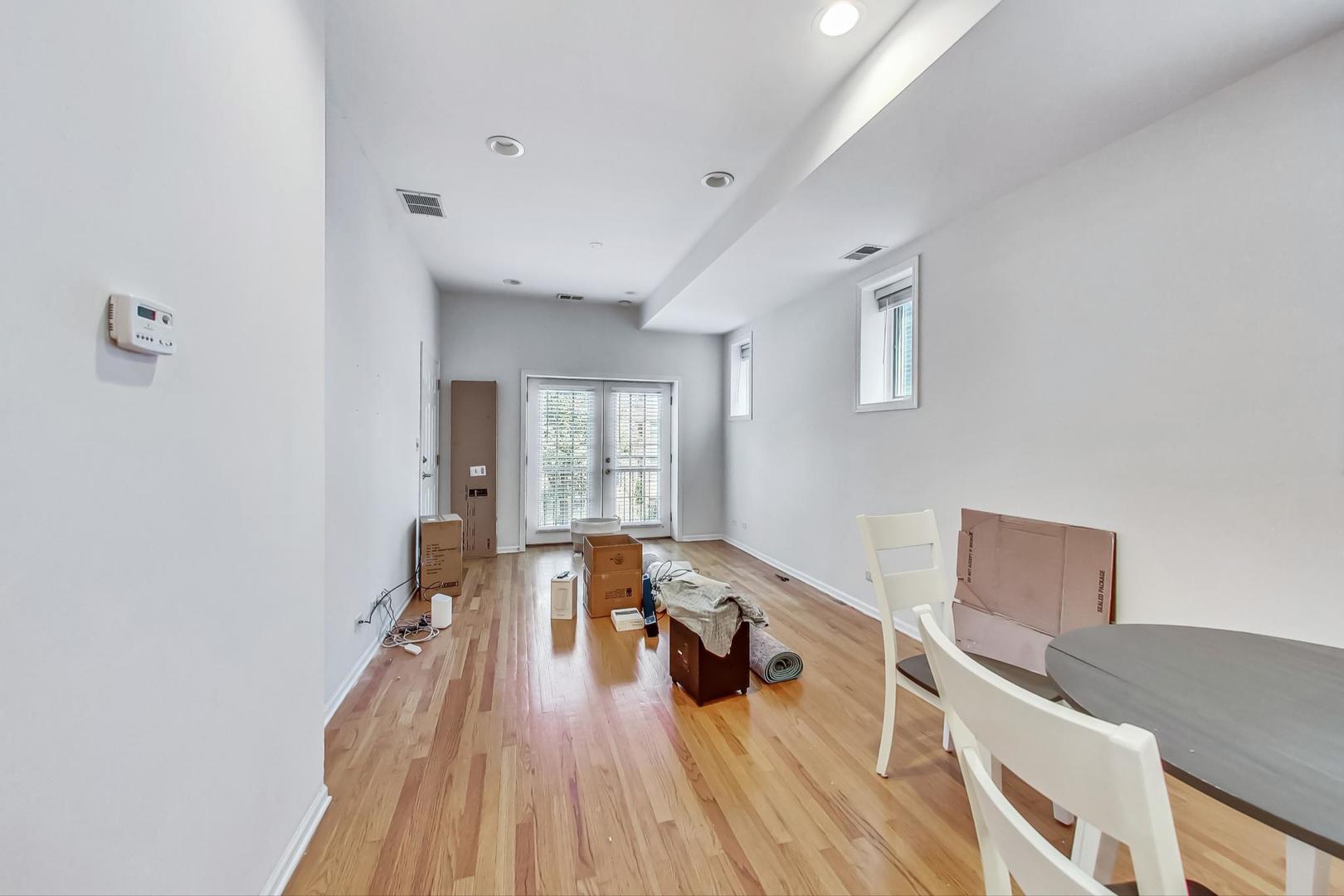 1119 West Addison Street Chicago, IL 60613 - Photo 25 of 36 a view of a living room and dining room