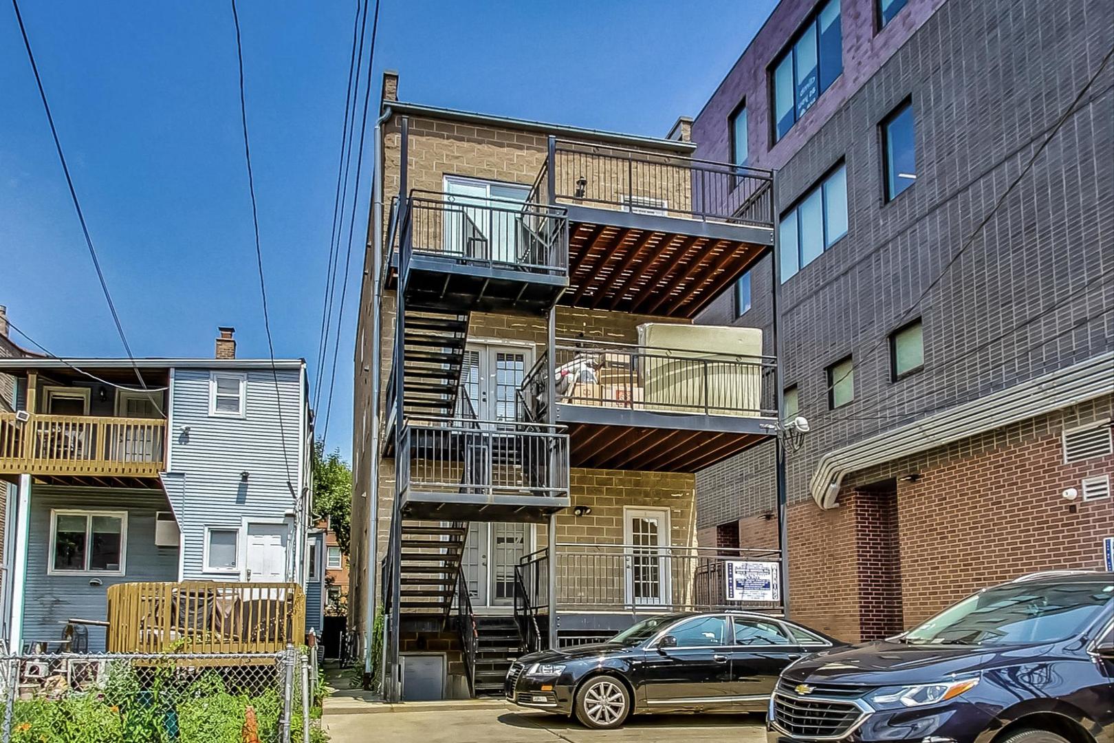 1119 West Addison Street Chicago, IL 60613 - Photo 34 of 36 a car parked in front of a building