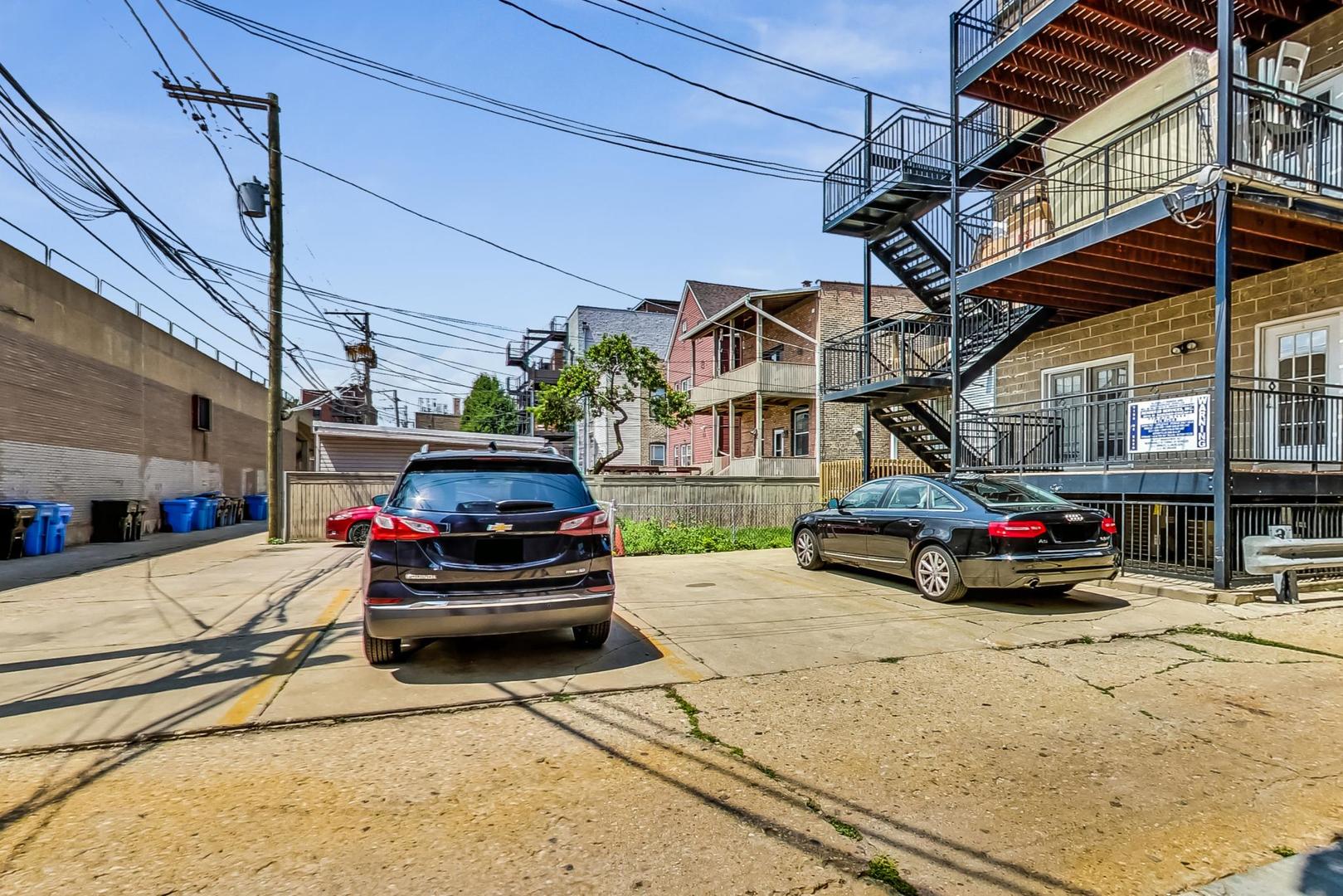 1119 West Addison Street Chicago, IL 60613 - Photo 36 of 36 a view of a cars park in front of a building