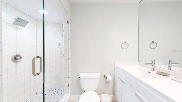 a bed room with a bed and a window