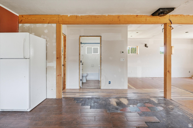 395 North 400 West Logan, UT 84321 - Photo 9 of 48 Interior featuring visible structural beams, wood-finish flooring, and recessed lighting