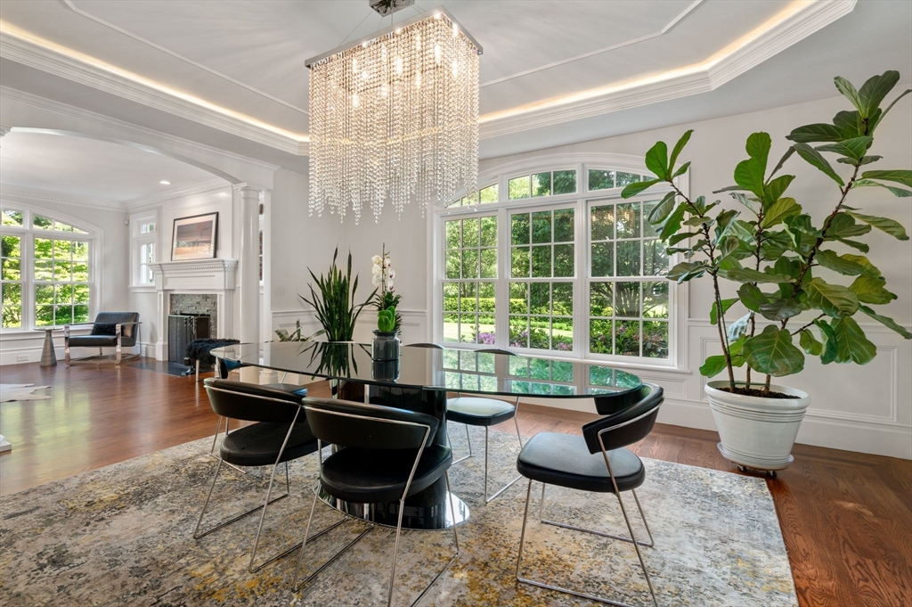 55 Radcliffe Road Weston, MA 02493 - Photo 11 of 38 a living room with furniture and a chandelier