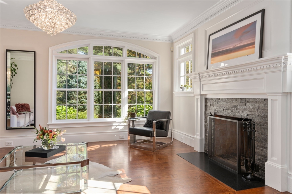 55 Radcliffe Road Weston, MA 02493 - Photo 12 of 38 a living room with furniture and a fireplace