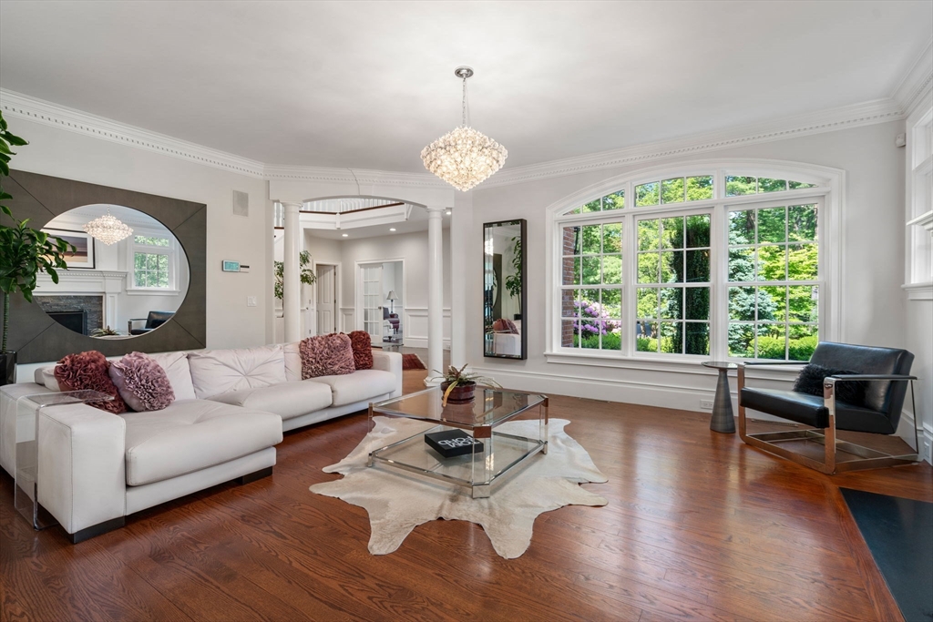 55 Radcliffe Road Weston, MA 02493 - Photo 13 of 38 a living room with furniture and a large window