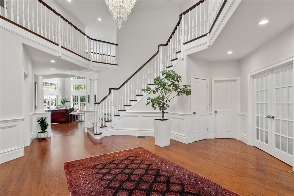 55 Radcliffe Road Weston, MA 02493 - Photo 15 of 38 a view of entryway and hall with wooden floor