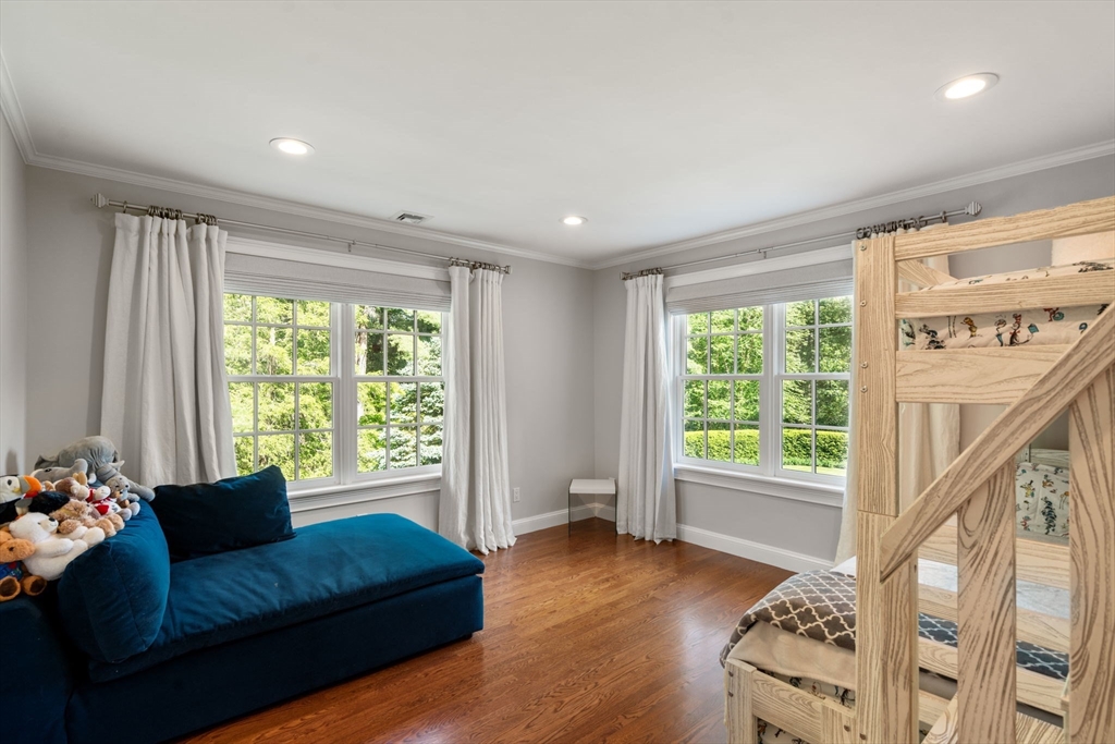 55 Radcliffe Road Weston, MA 02493 - Photo 24 of 38 a living room with furniture and a large window