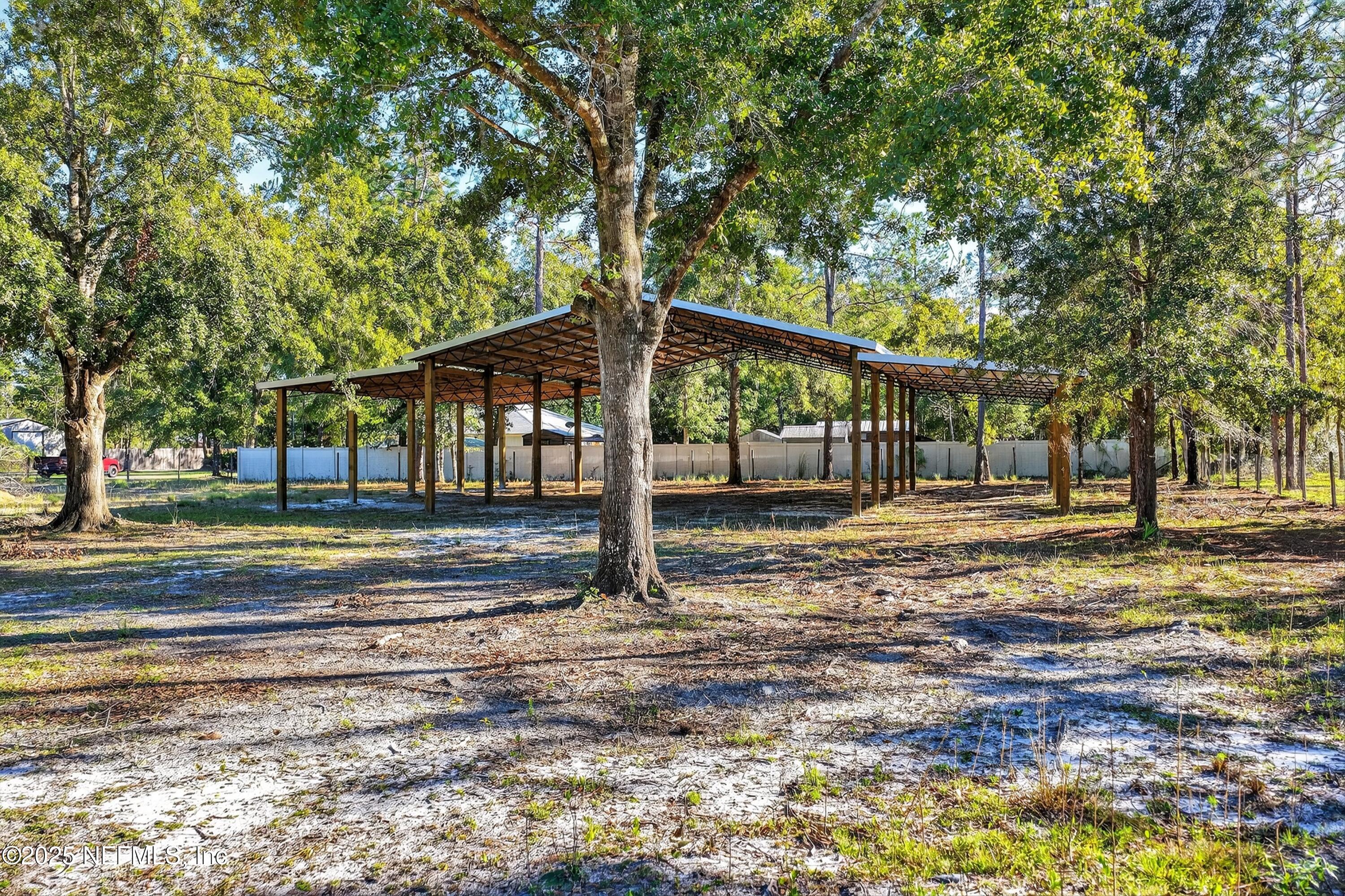 3452 Rustic Oak Trail Middleburg, FL 32068 - Photo 1 of 25 08-DJI_20251017163342_0925_D