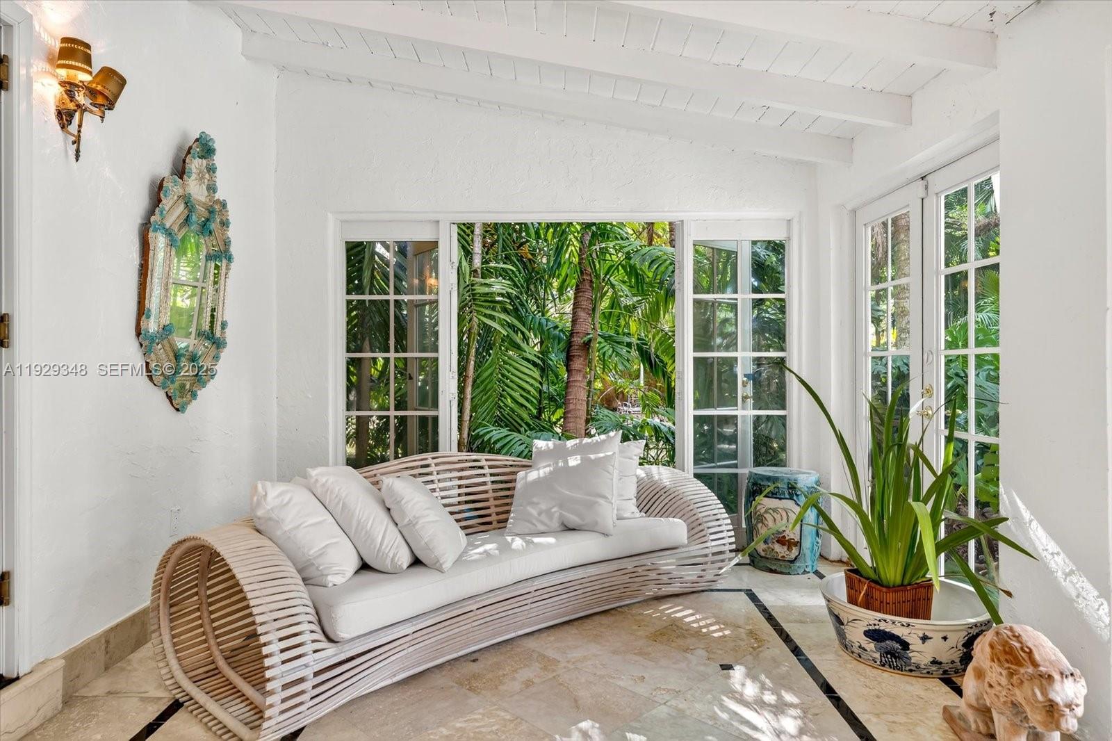 4190 Ingraham Highway Miami, FL 33133 - Photo 13 of 26 a living room with furniture and a potted plant