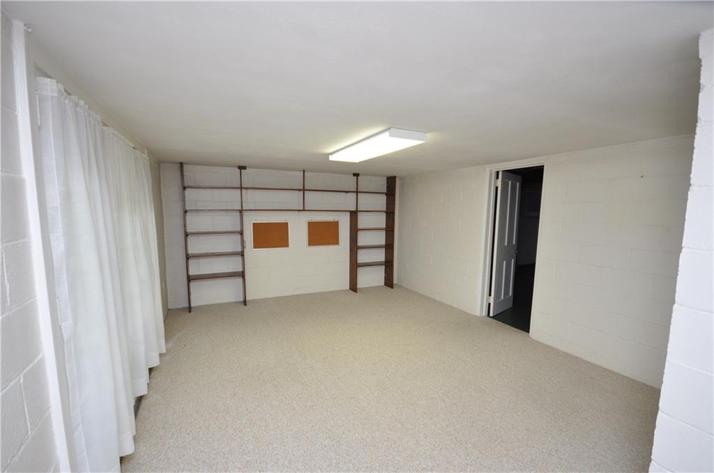 418 Sulgrave Road Pittsburgh, PA 15211 - Photo 15 of 17 a view of empty room with white walls and window