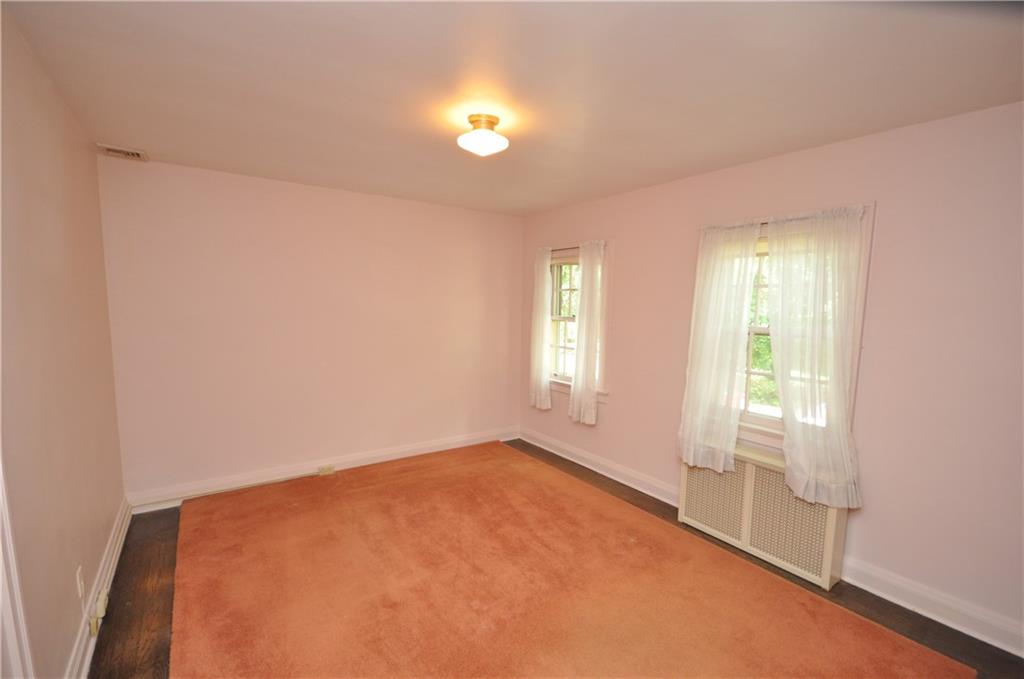 418 Sulgrave Road Pittsburgh, PA 15211 - Photo 9 of 17 a view of an empty room with a window