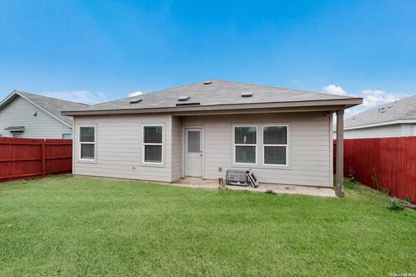 a front view of house with yard