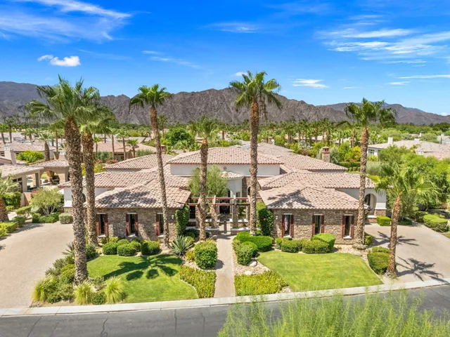 a view of a living room and dining room