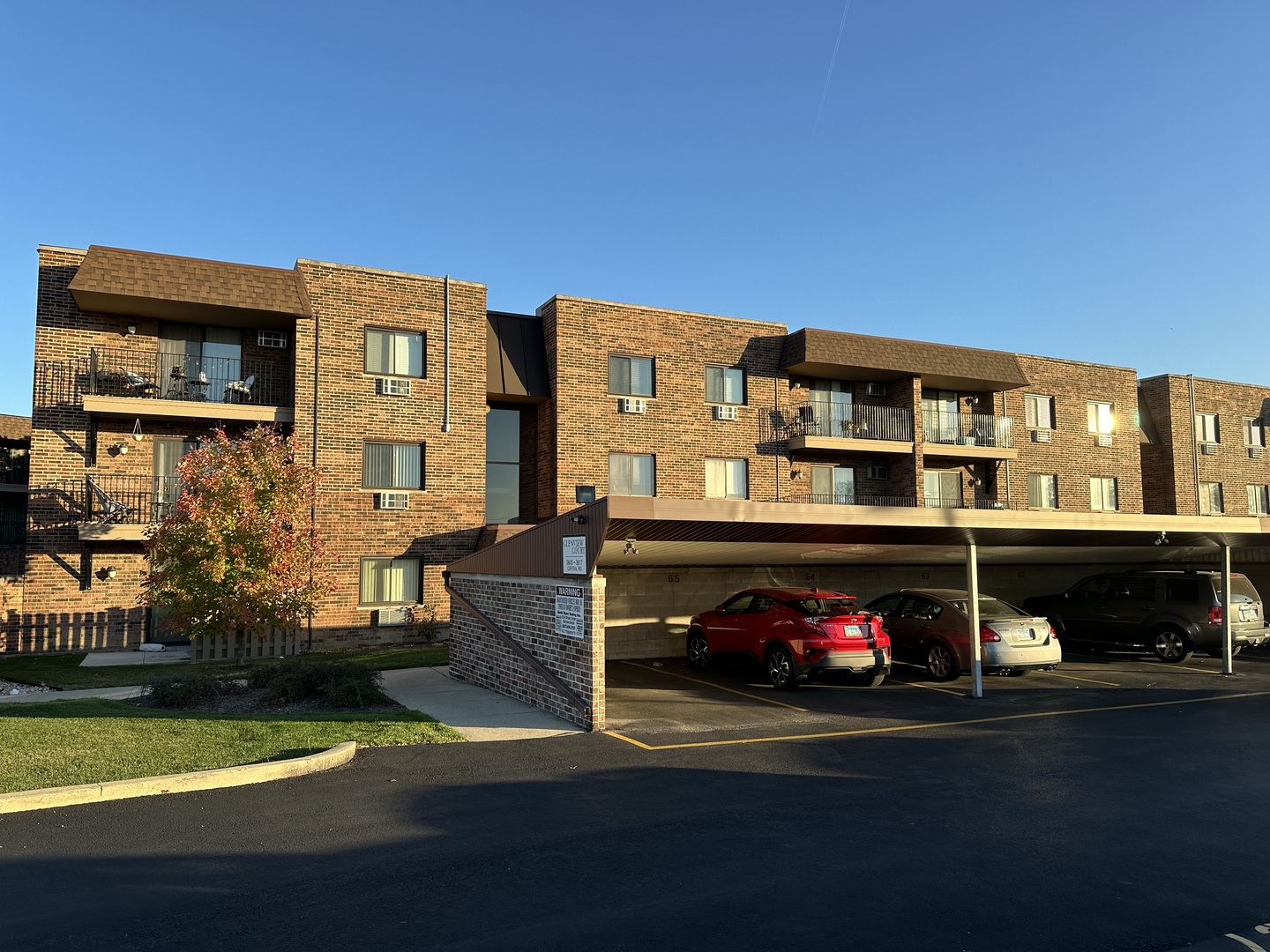 3609 Central Road, Unit 302 Glenview, IL 60025 - Photo 1 of 15 a car parked in front of a building