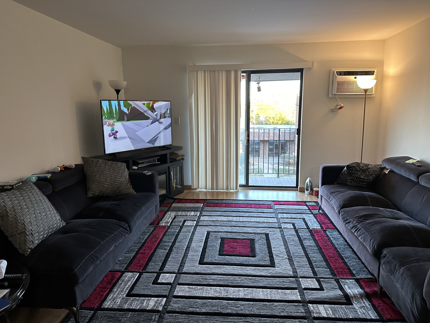 3609 Central Road, Unit 302 Glenview, IL 60025 - Photo 7 of 15 a living room with furniture and a flat screen tv
