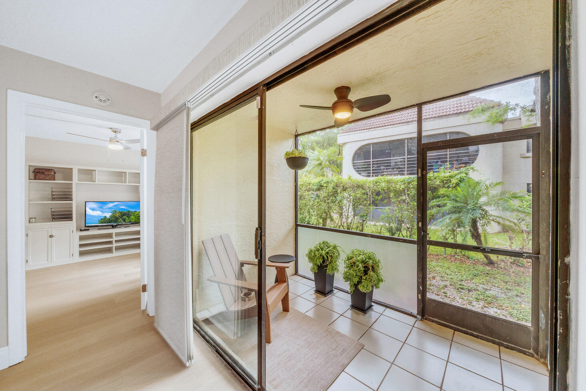 22136 Palms Way, Unit 103 Boca Raton, FL 33433 - Photo 12 of 42 a front view of a house with a potted plant