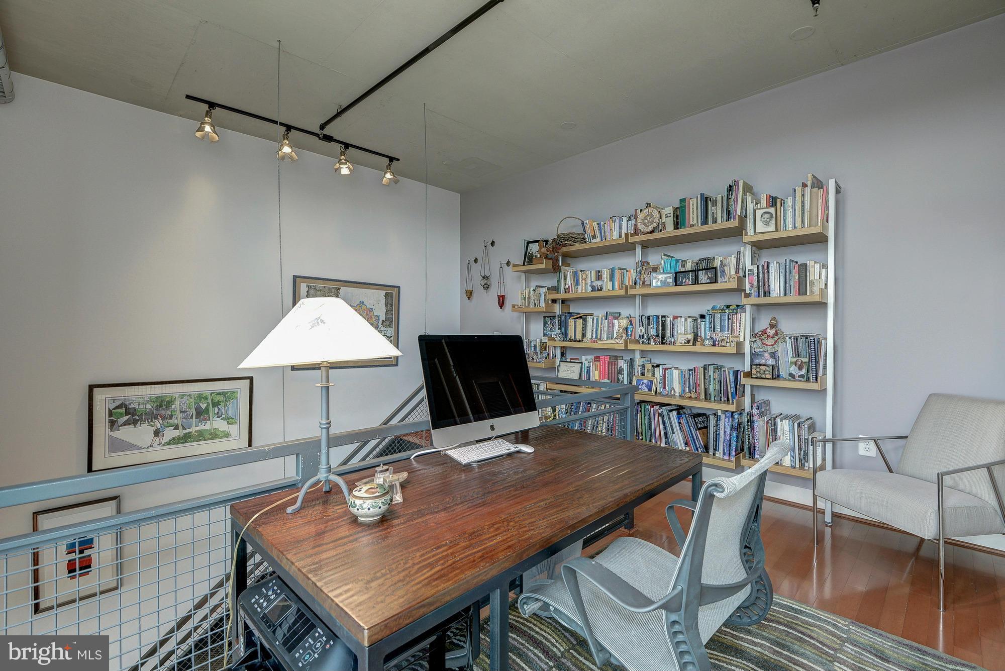 2125 14th Street Northwest, Unit 913 Washington, DC 20009 - Photo 11 of 14 a view of a workspace with furniture