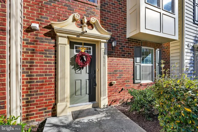 a front view of a multi story residential apartment building