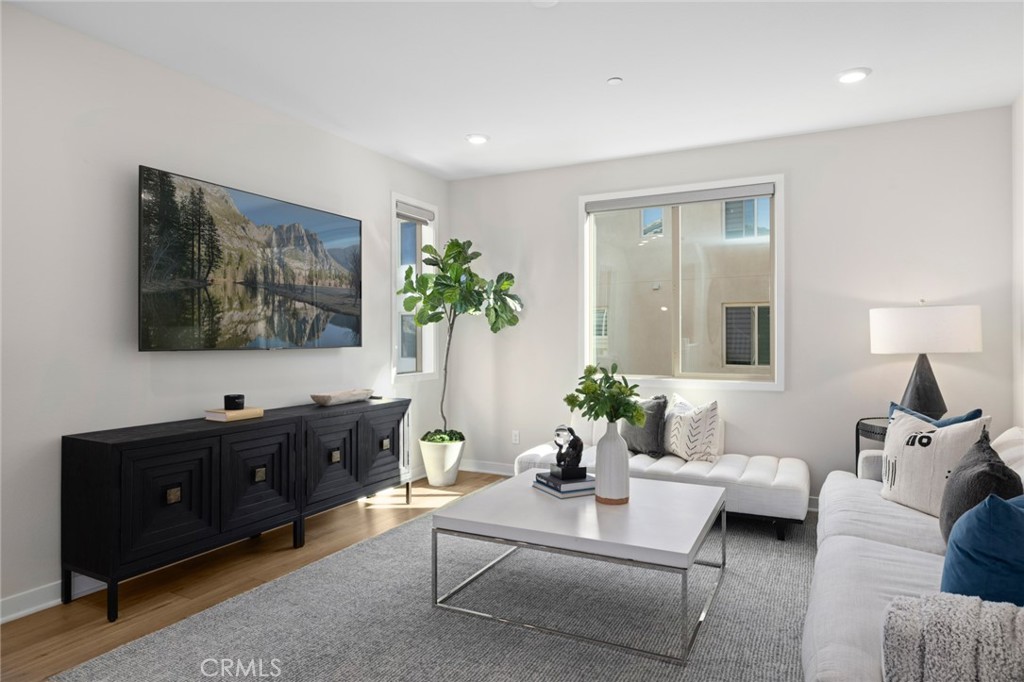 526 Serrano Summit Drive Lake Forest, CA 92630 - Photo 15 of 59 a living room with furniture and a flat screen tv