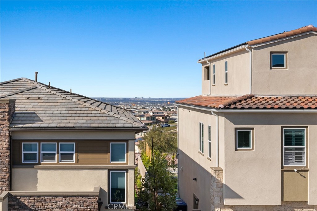 526 Serrano Summit Drive Lake Forest, CA 92630 - Photo 20 of 59 a front view of a house with a balcony