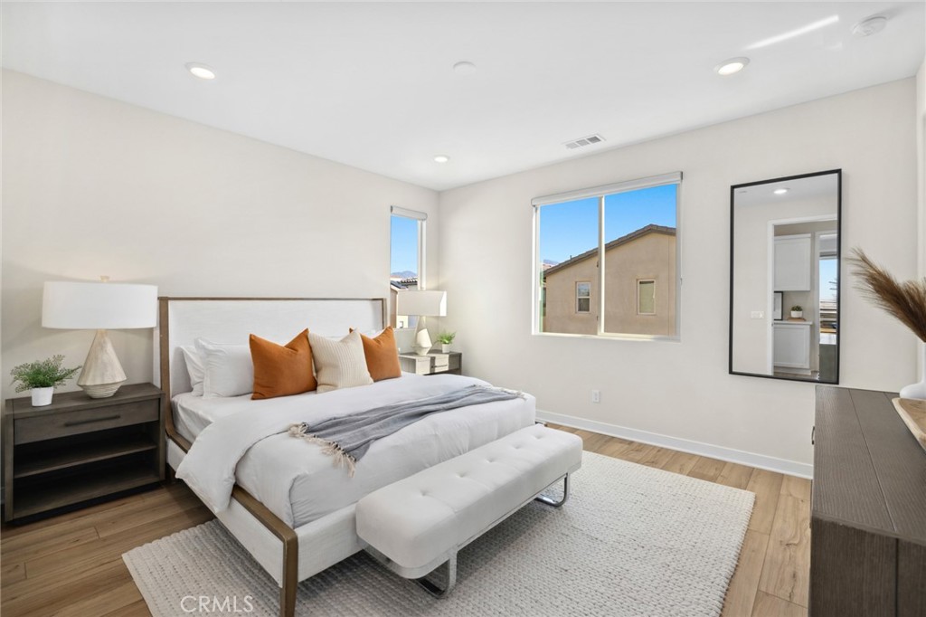 526 Serrano Summit Drive Lake Forest, CA 92630 - Photo 24 of 59 a bedroom with a bed and a night stand