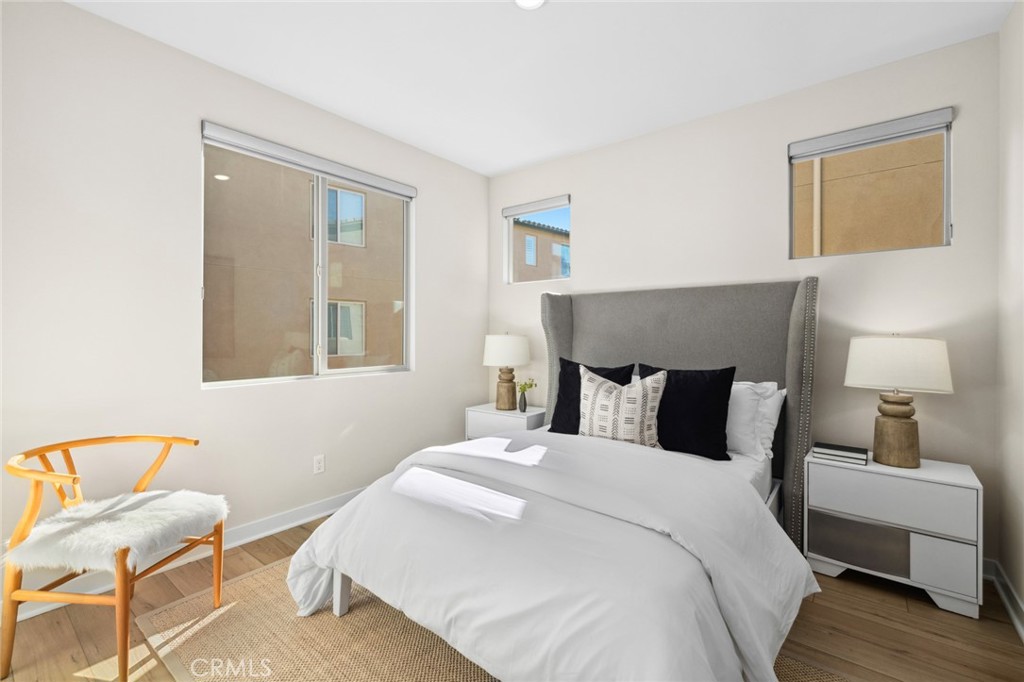 526 Serrano Summit Drive Lake Forest, CA 92630 - Photo 26 of 59 a bedroom with a bed and a lamp