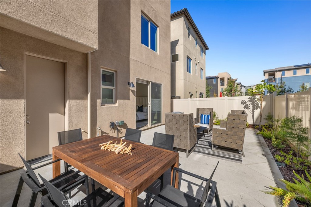 526 Serrano Summit Drive Lake Forest, CA 92630 - Photo 30 of 59 a view of an outside dining space with furniture
