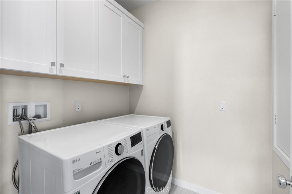 526 Serrano Summit Drive Lake Forest, CA 92630 - Photo 34 of 59 a utility room with dryer and washer