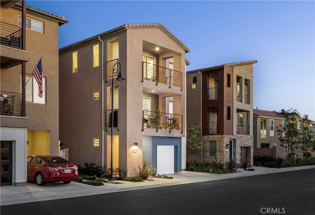 526 Serrano Summit Drive Lake Forest, CA 92630 - Photo 35 of 59 a front view of a building with a street