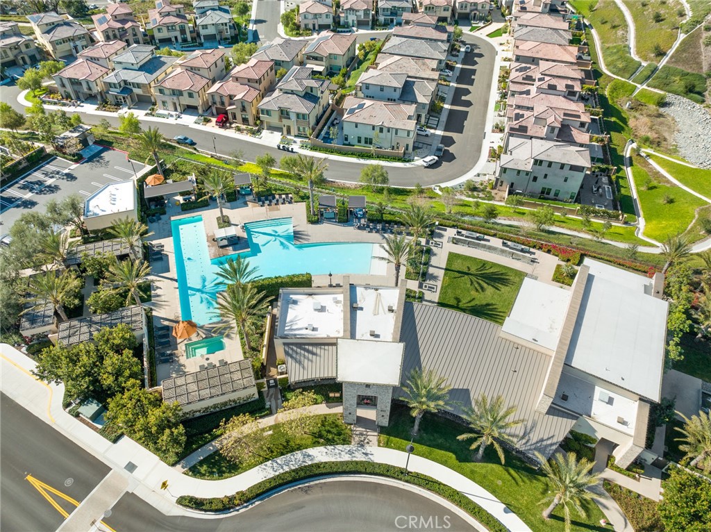 526 Serrano Summit Drive Lake Forest, CA 92630 - Photo 44 of 59 an aerial view of a residential apartment building with a yard