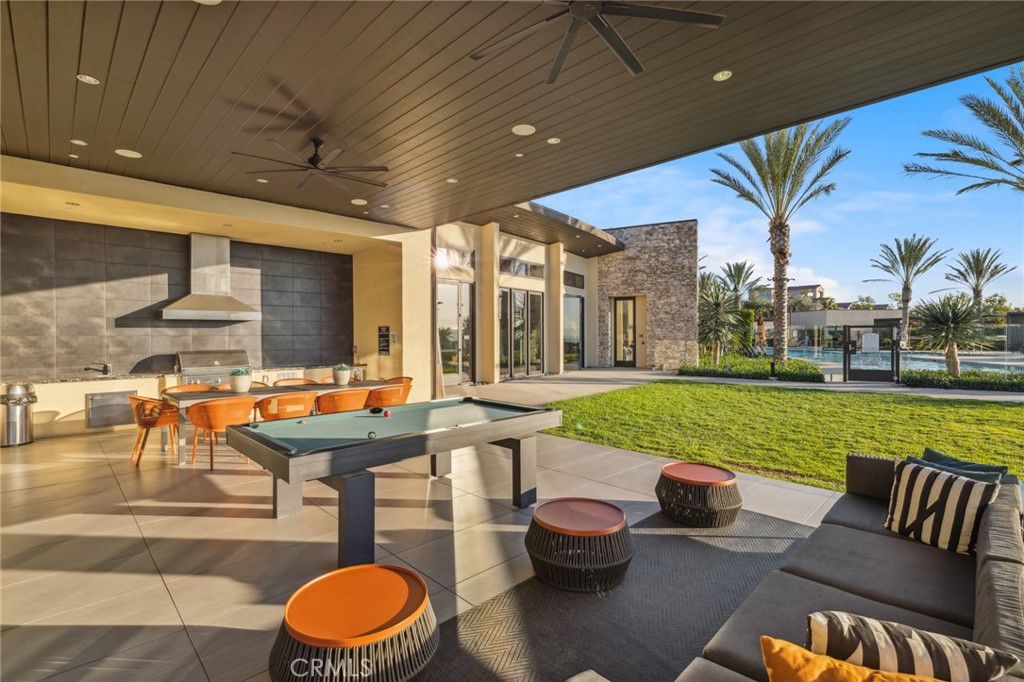 526 Serrano Summit Drive Lake Forest, CA 92630 - Photo 49 of 59 a view of a patio with chairs and a table