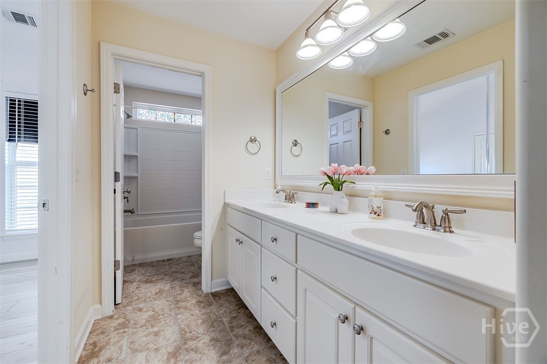 663 Wyndham Way Pooler, GA 31322 - Photo 38 of 66 Full Jack n' Jill bathroom from bedroom 2 and 3 upstairs