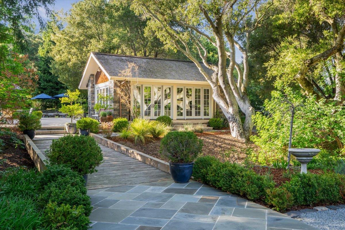 3510 Alpine Road Portola Valley, CA 94028 - Photo 44 of 77 a view of a house with a yard and potted plants