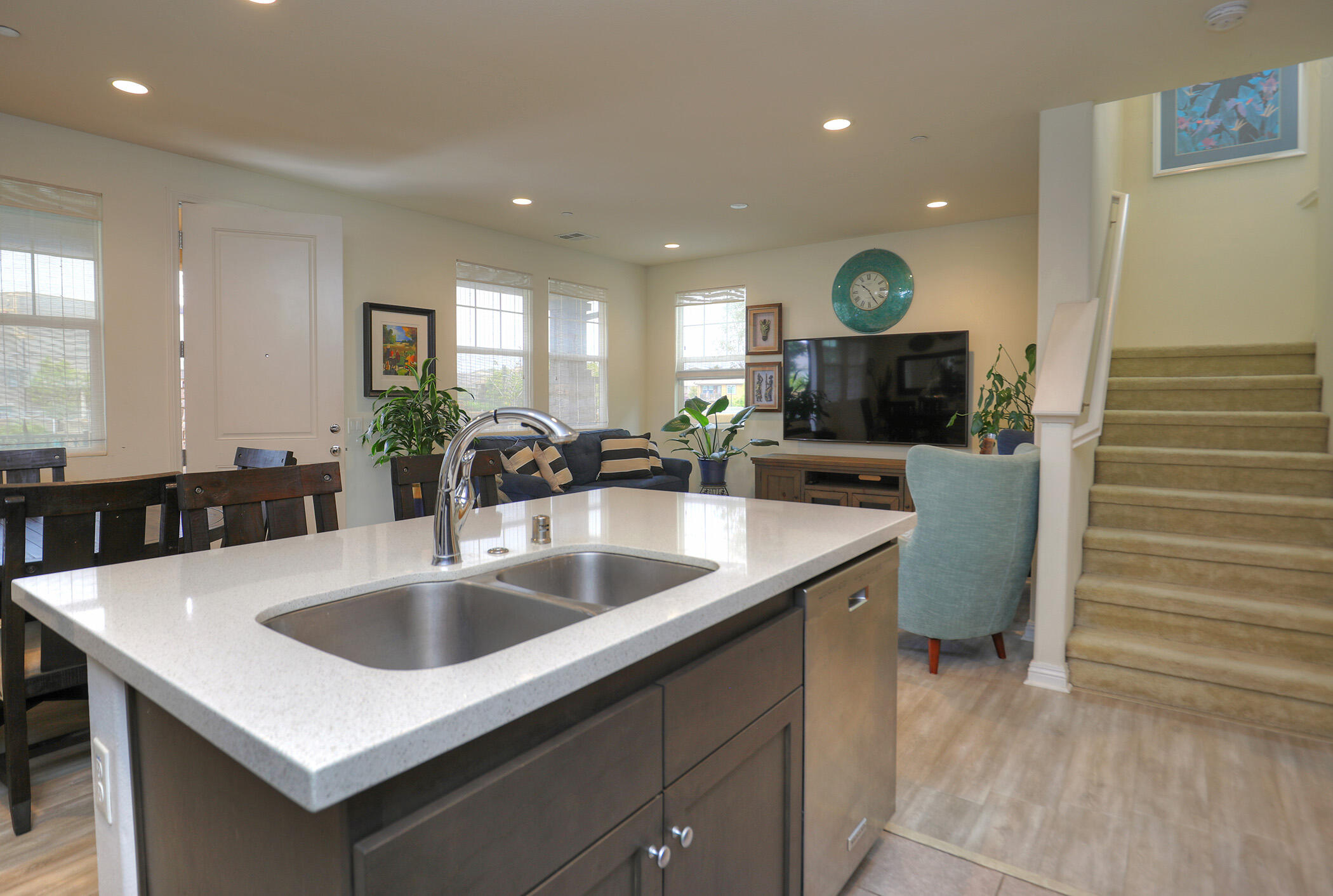 6607 Fathom Way Goleta, CA 93117 - Photo 11 of 37 a kitchen with a sink and a refrigerator