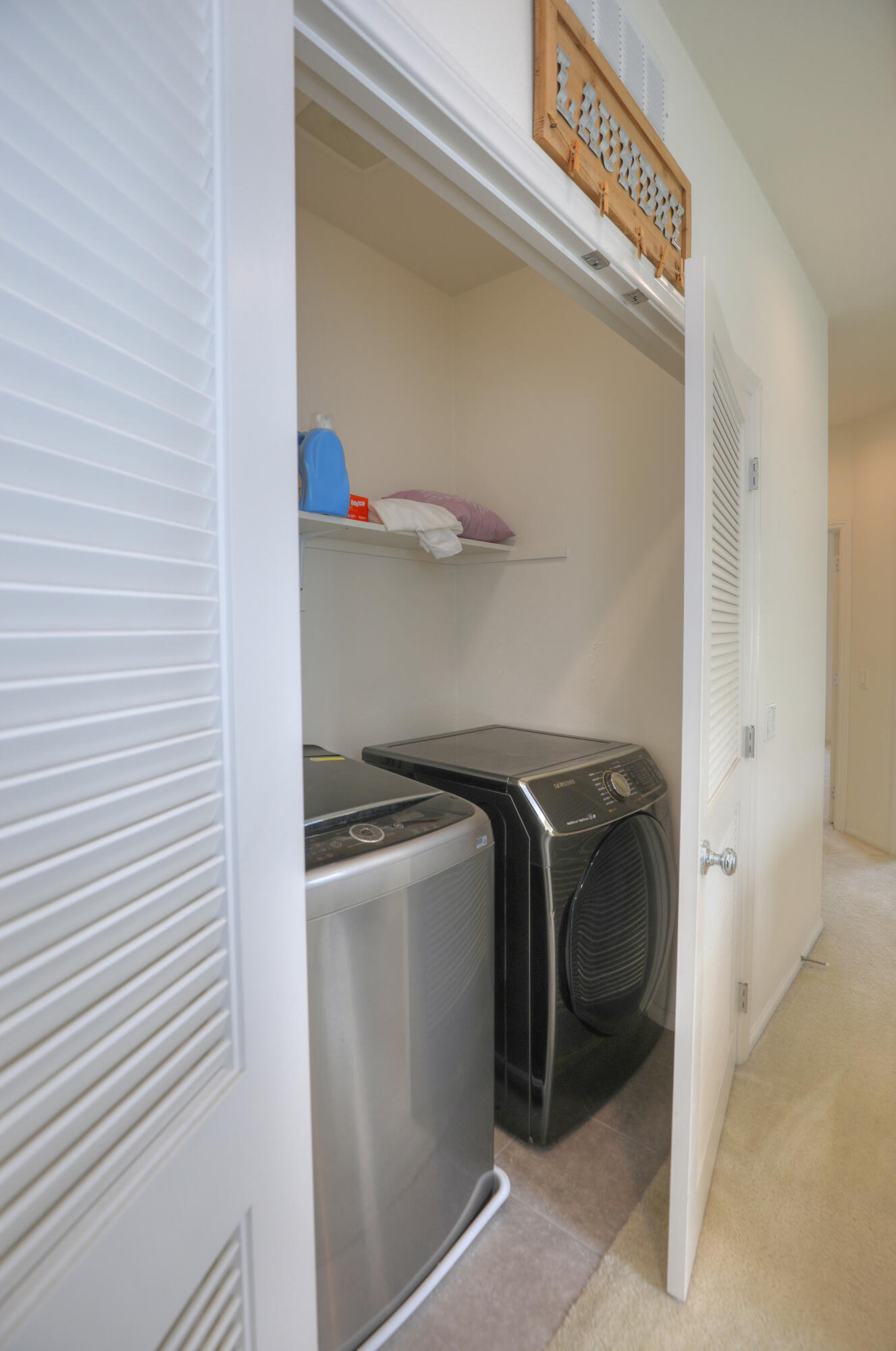 6607 Fathom Way Goleta, CA 93117 - Photo 23 of 37 a utility room with dryer and washer