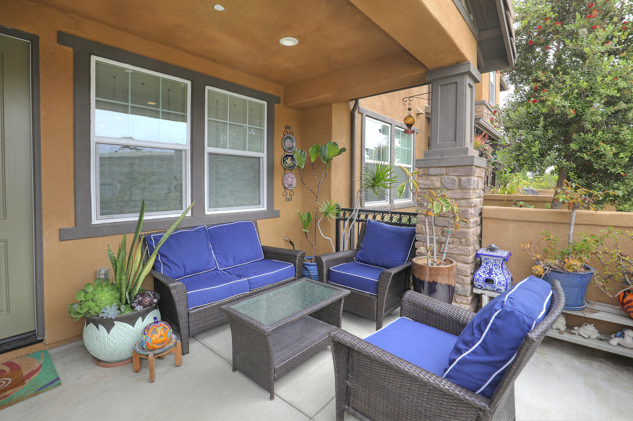 6607 Fathom Way Goleta, CA 93117 - Photo 4 of 37 a outdoor living space with furniture and a potted plant