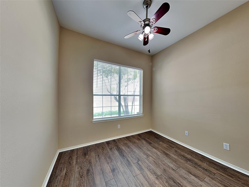 645 Chalk Knoll Road Fort Worth, TX 76108 - Photo 11 of 17 wooden floor in an empty room with a window