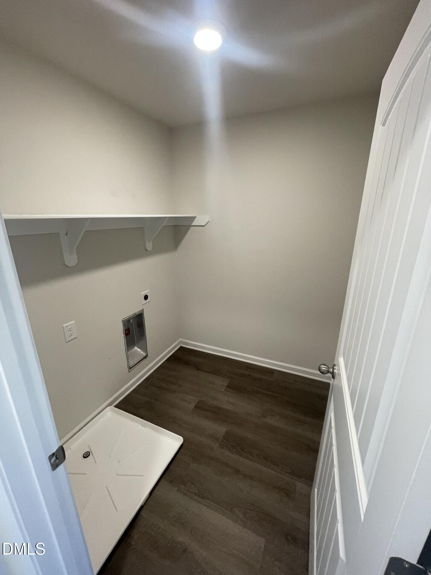 1097 Peony Lane Youngsville, NC 27596 - Photo 10 of 15 an empty room with wooden floor and sink