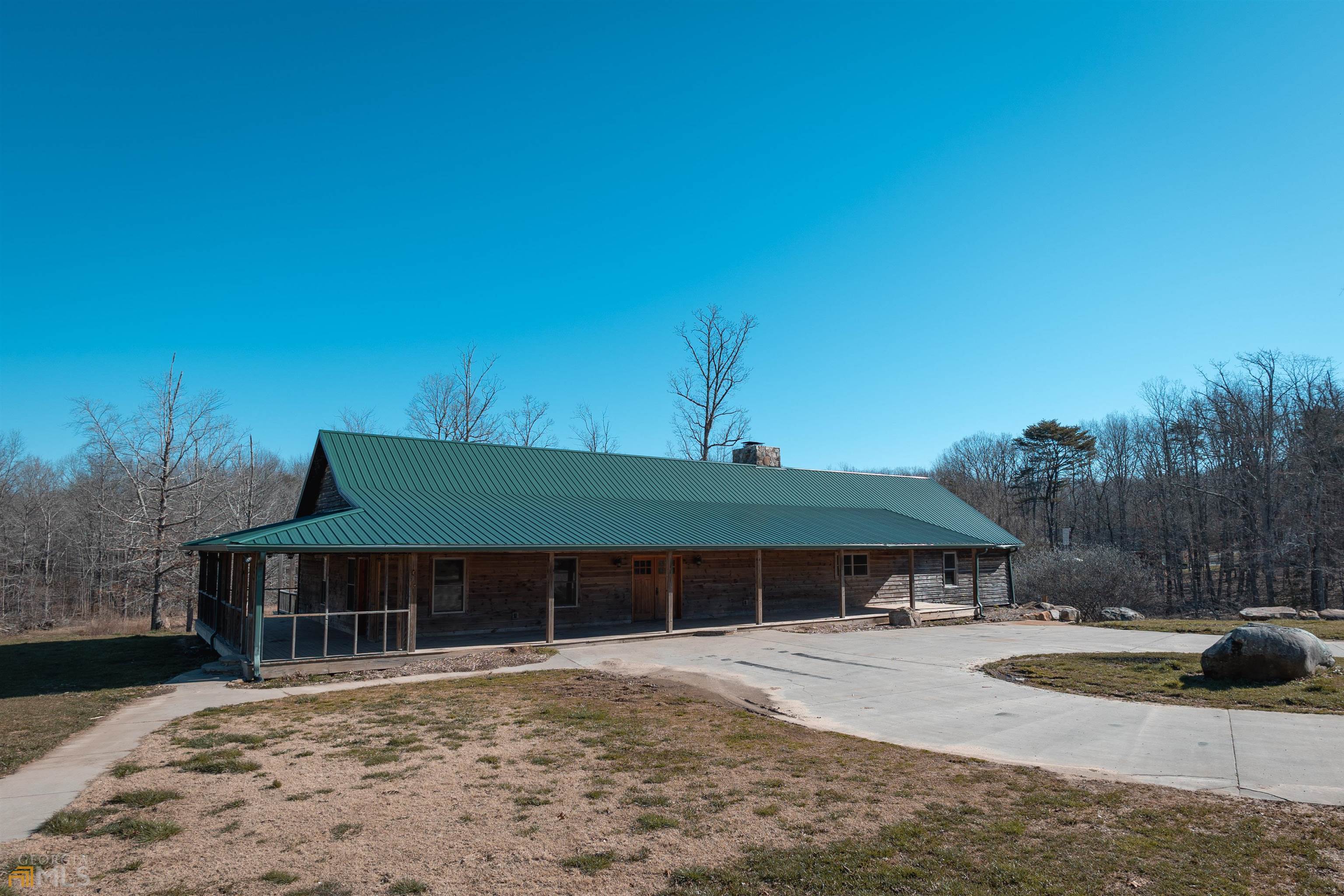 13775 Highway 136 Rising Fawn, GA 30738 - Photo 1 of 1 a front view of a house with a yard
