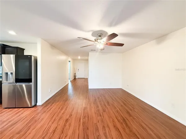 a view of a livingroom with wooden floor