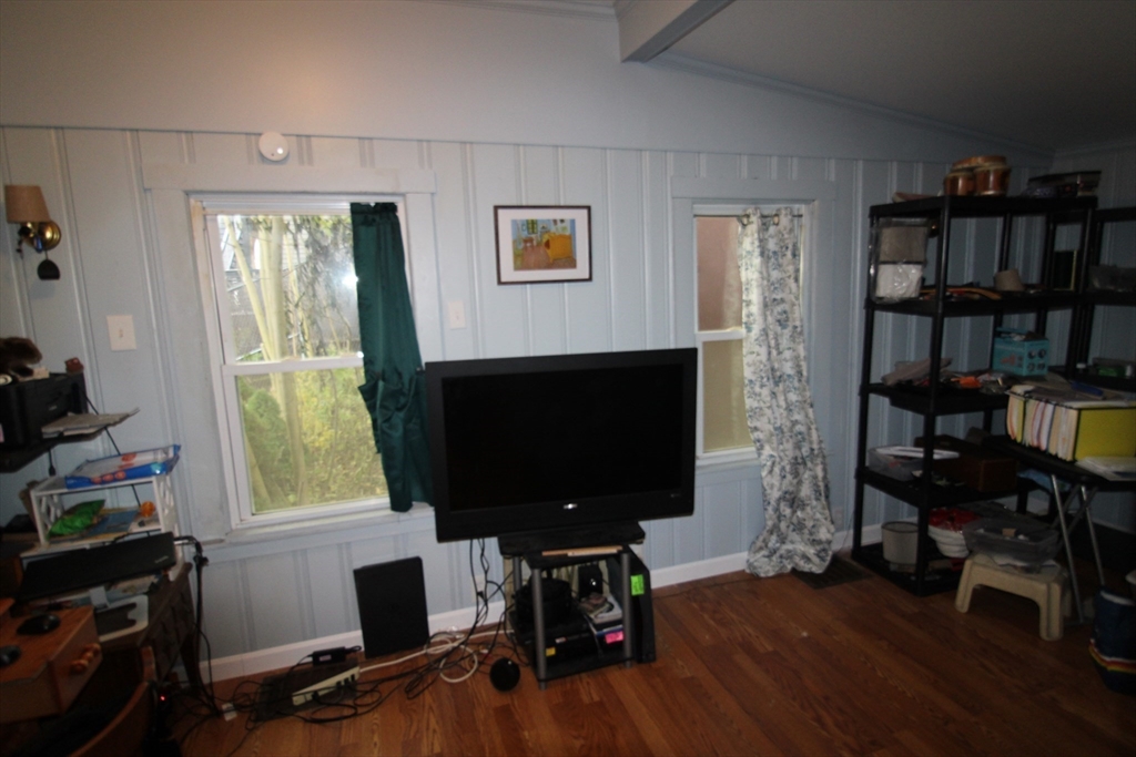 340 Lake Avenue Worcester, MA 01604 - Photo 27 of 37 a view of a livingroom with furniture and a flat screen tv