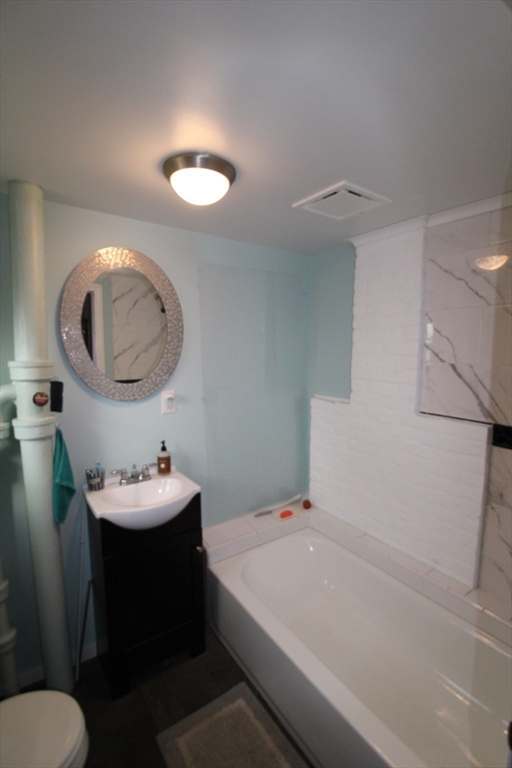 340 Lake Avenue Worcester, MA 01604 - Photo 30 of 37 a bathroom with a sink and a mirror