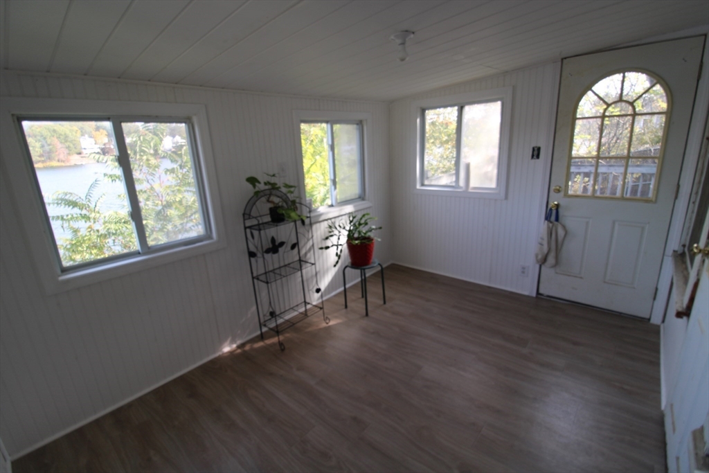 340 Lake Avenue Worcester, MA 01604 - Photo 35 of 37 a view of an empty room with wooden floor and a window