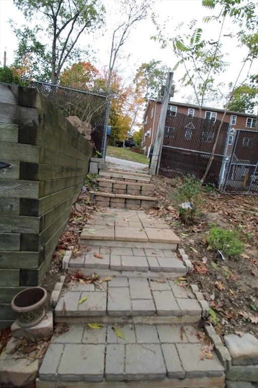 340 Lake Avenue Worcester, MA 01604 - Photo 4 of 37 a backyard of a house with lots of green space