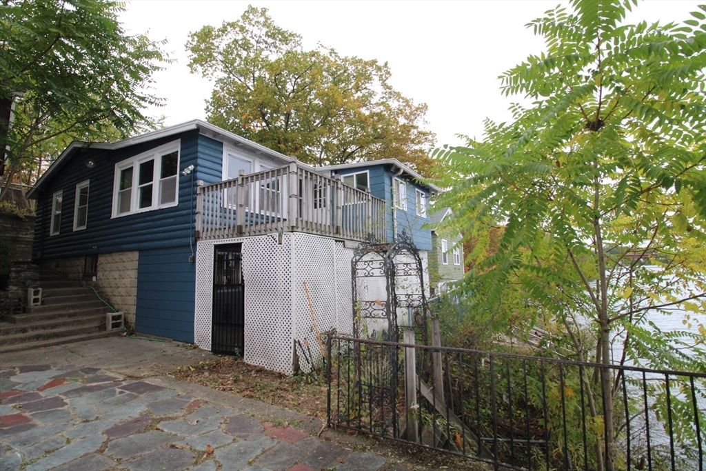 340 Lake Avenue Worcester, MA 01604 - Photo 10 of 37 a view of a house with a yard