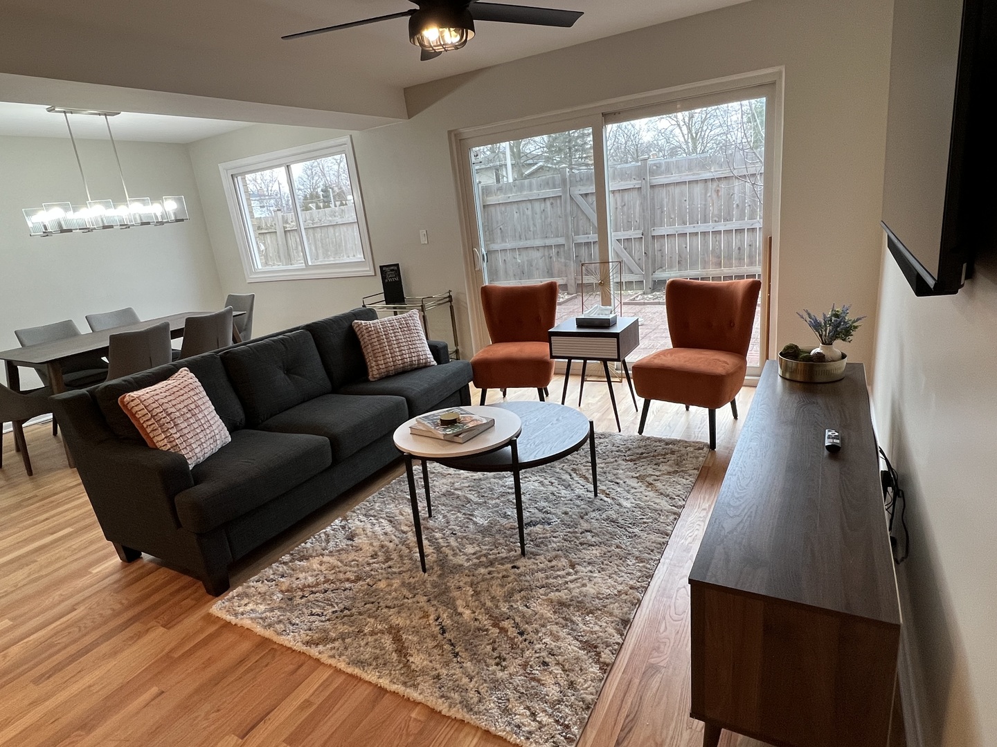 725 Hibbard Road Wilmette, IL 60091 - Photo 6 of 15 a living room with furniture and a flat screen tv