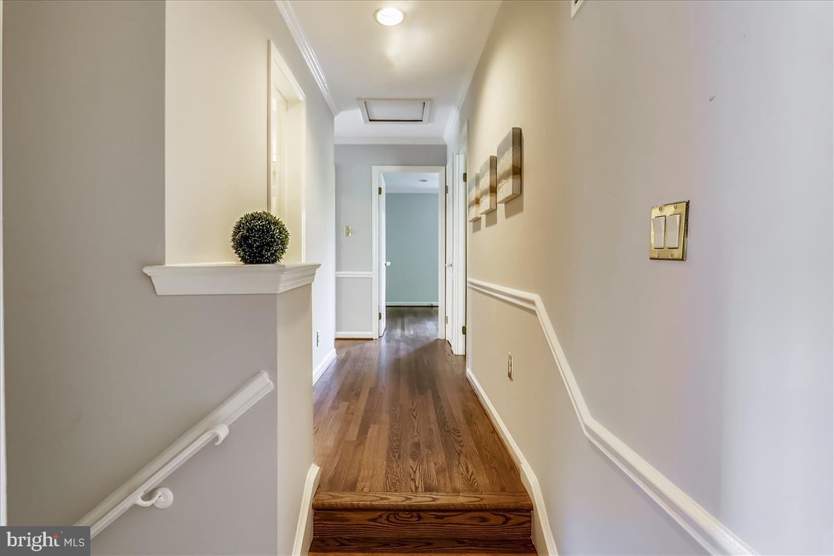 9801 Brookford Road Potomac, MD 20854 - Photo 33 of 82 Step-up hallway to bedrooms