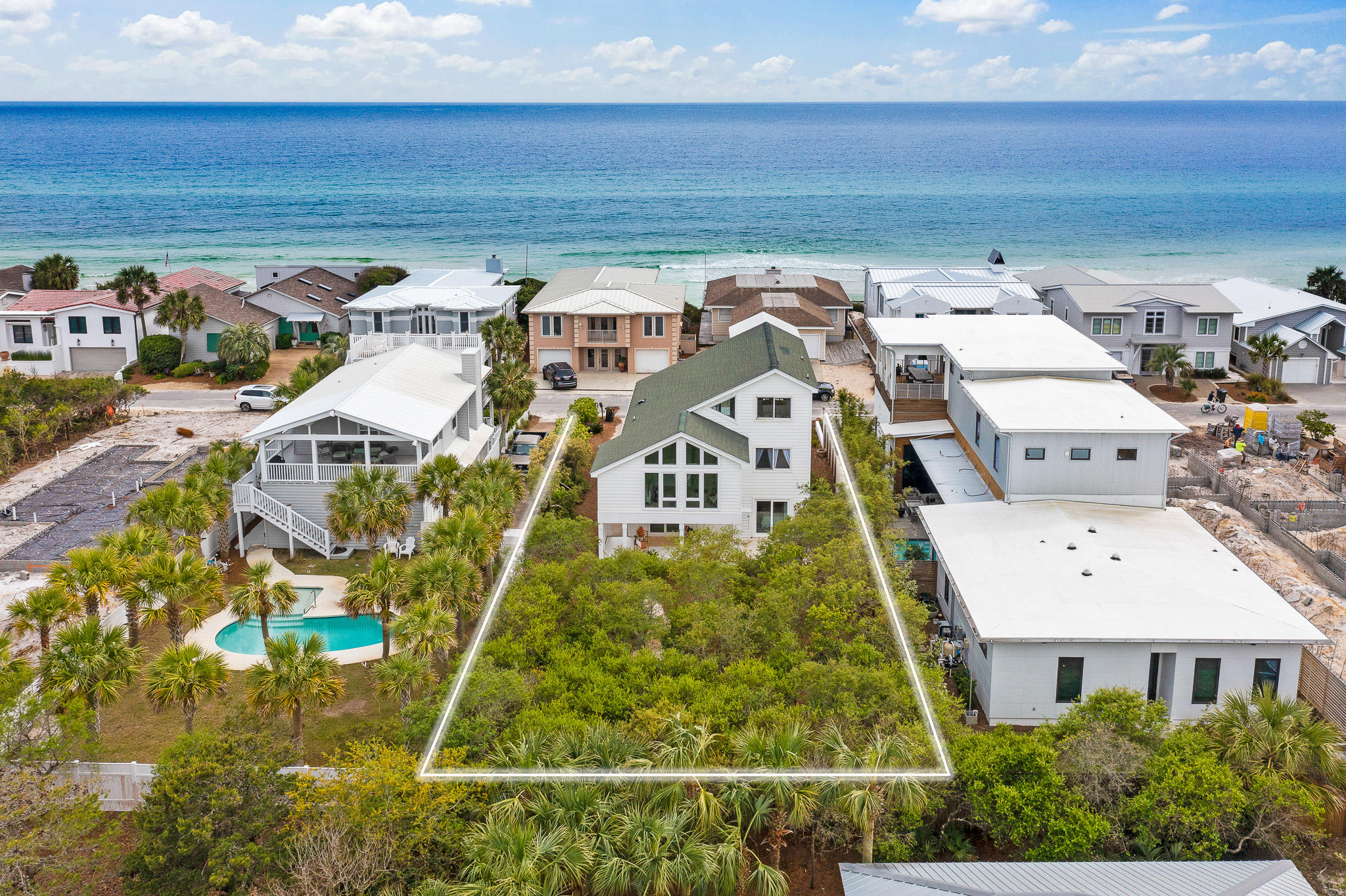 207 Sand Cliffs Drive Inlet Beach, FL 32461 - Photo 20 of 26 a aerial view of a residential apartment building with a yard